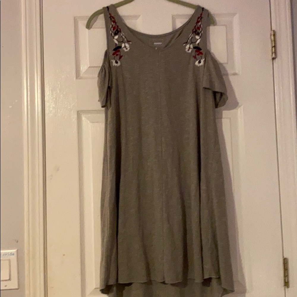 Light green dress with flowers on the sleeves